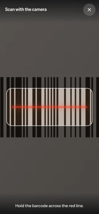 Camera scanning on a phone: a barcode held across a red line, with the hint Hold the barcode across the red line.